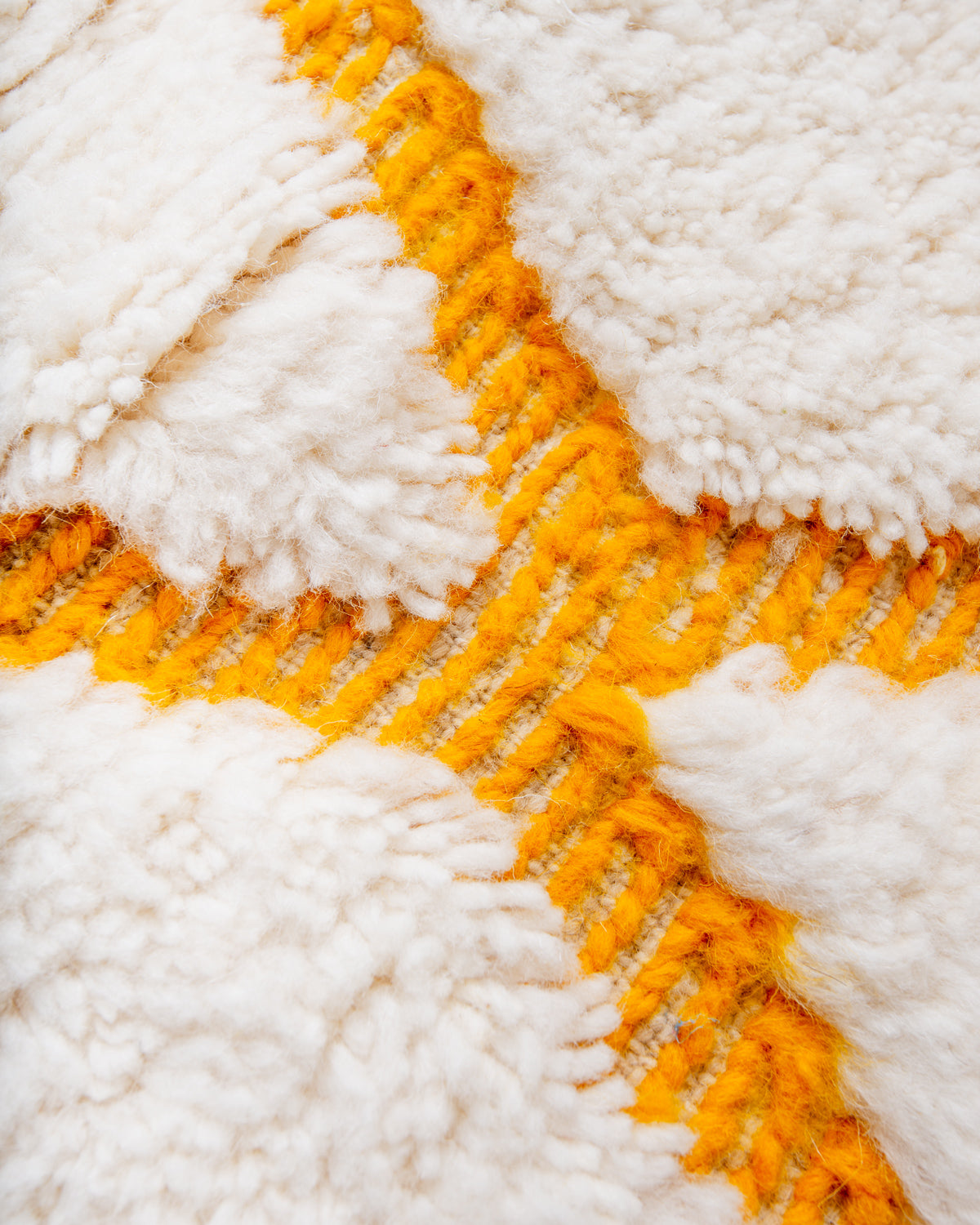 Modern, designer, handcrafted Berber rug from Morocco. Beniourain carpet with beautiful colours and patterns and fluffy wool texture.